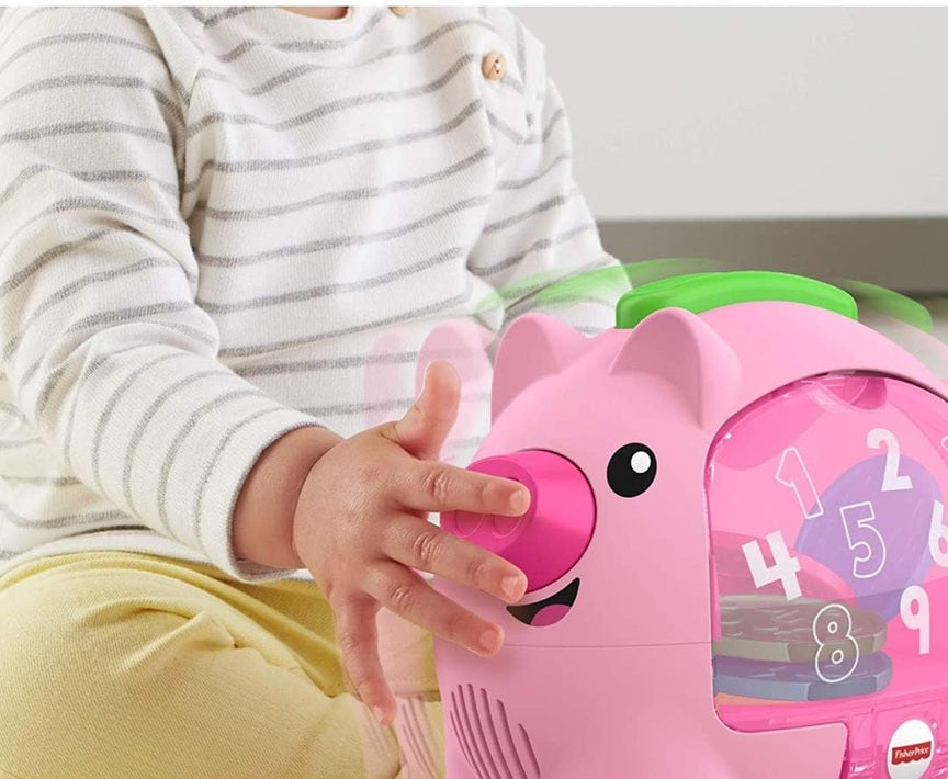 FISHER-PRICE tirelire interactive cochon mouvement et sons J. ANGLAIS