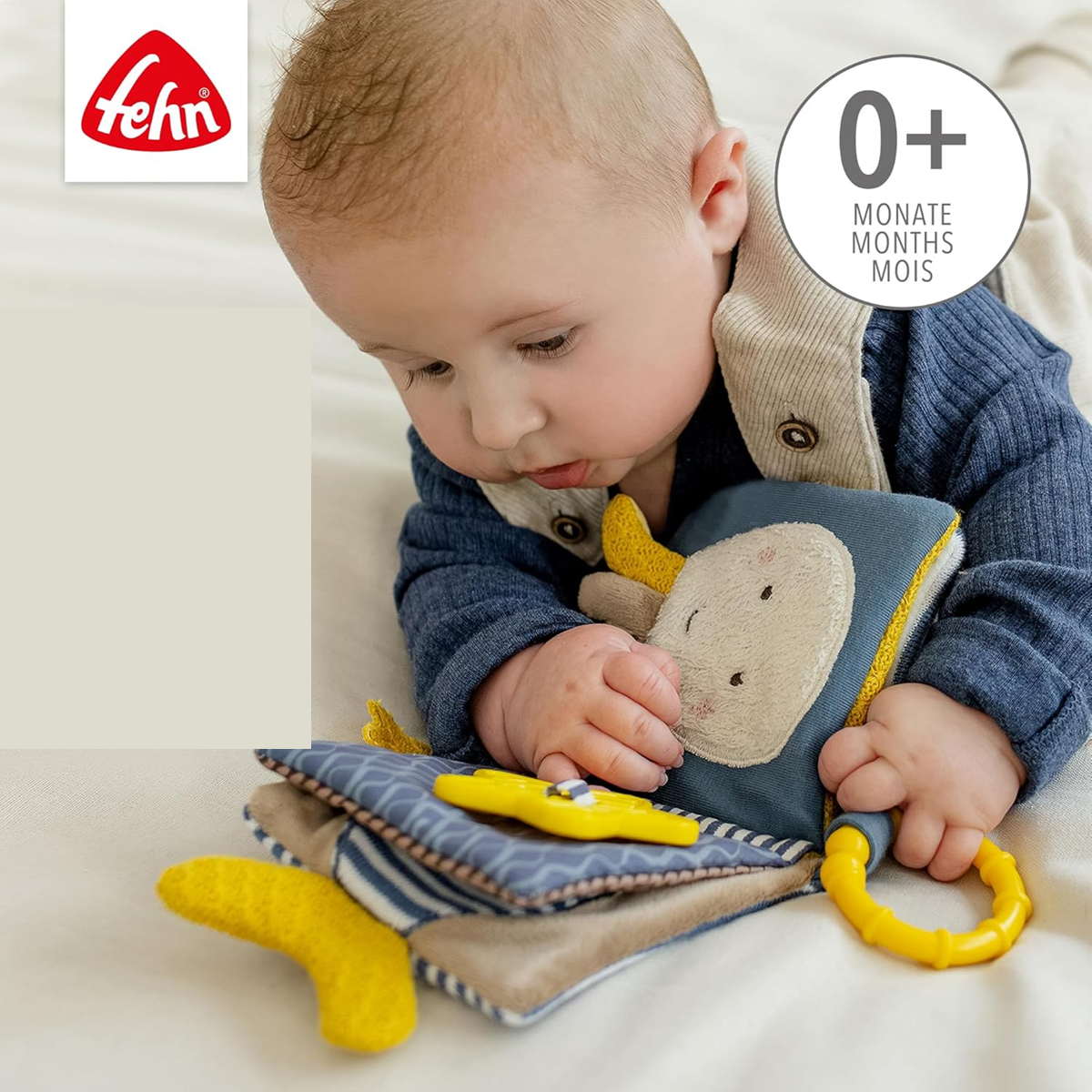 FEHN Wydra Theo libro sensoriale con specchio APPENDIBILE 11 x 11 cm