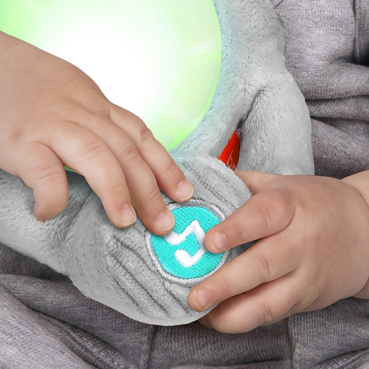 BRIGHT STARTS Huge-a-bye-Baby interaktív elefánt zenével és fényekkel 20 cm