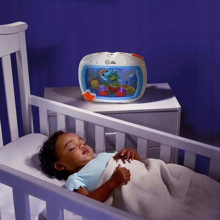 BABY EINSTEIN Tengeri álmok ZENÉLŐ DOBOZ + TÁVIRÁNYÍTÓ
