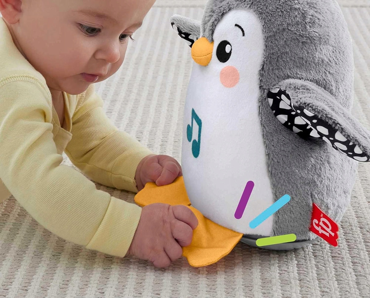 FISHER-PRICE HNC10 zenélő billegő pingvin, 21 cm