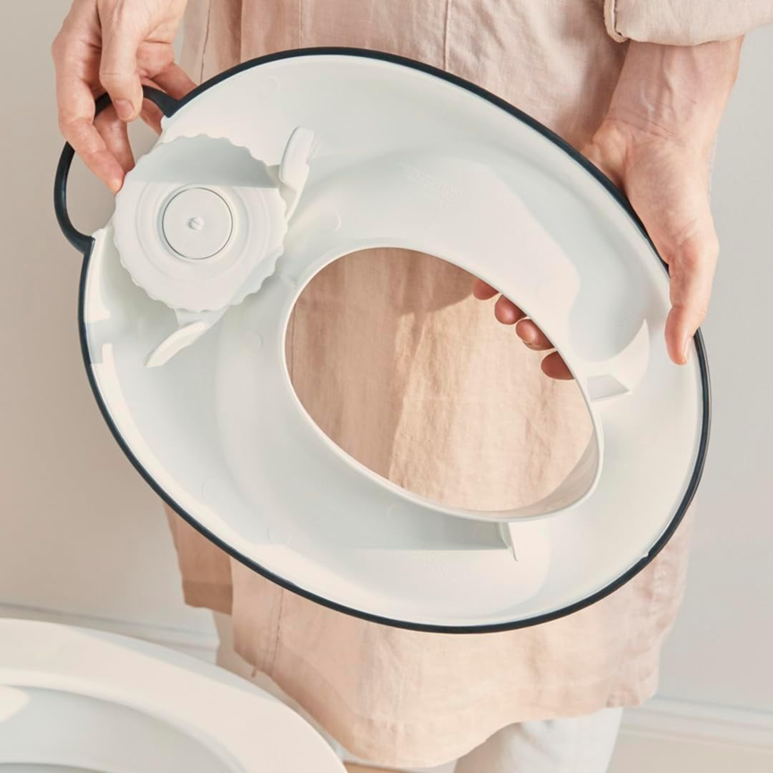 BABYBJORN adjustable toilet seat with a 12 x 18.5 cm opening