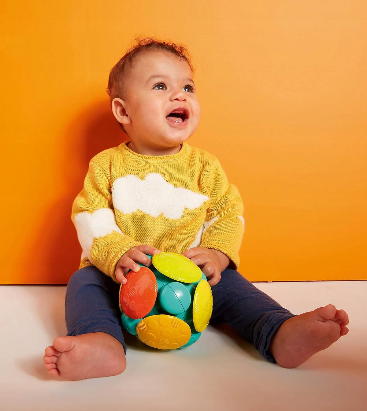 BRIGHT STARTS Wooble Booble bola vibratoria con melodía para gatear 12 cm
