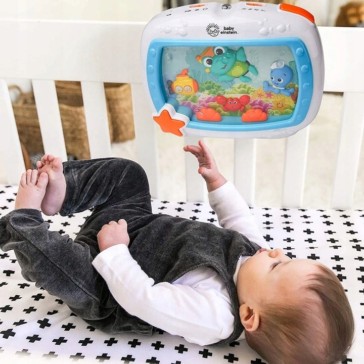BABY EINSTEIN Tengeri álmok ZENÉLŐ DOBOZ + TÁVIRÁNYÍTÓ