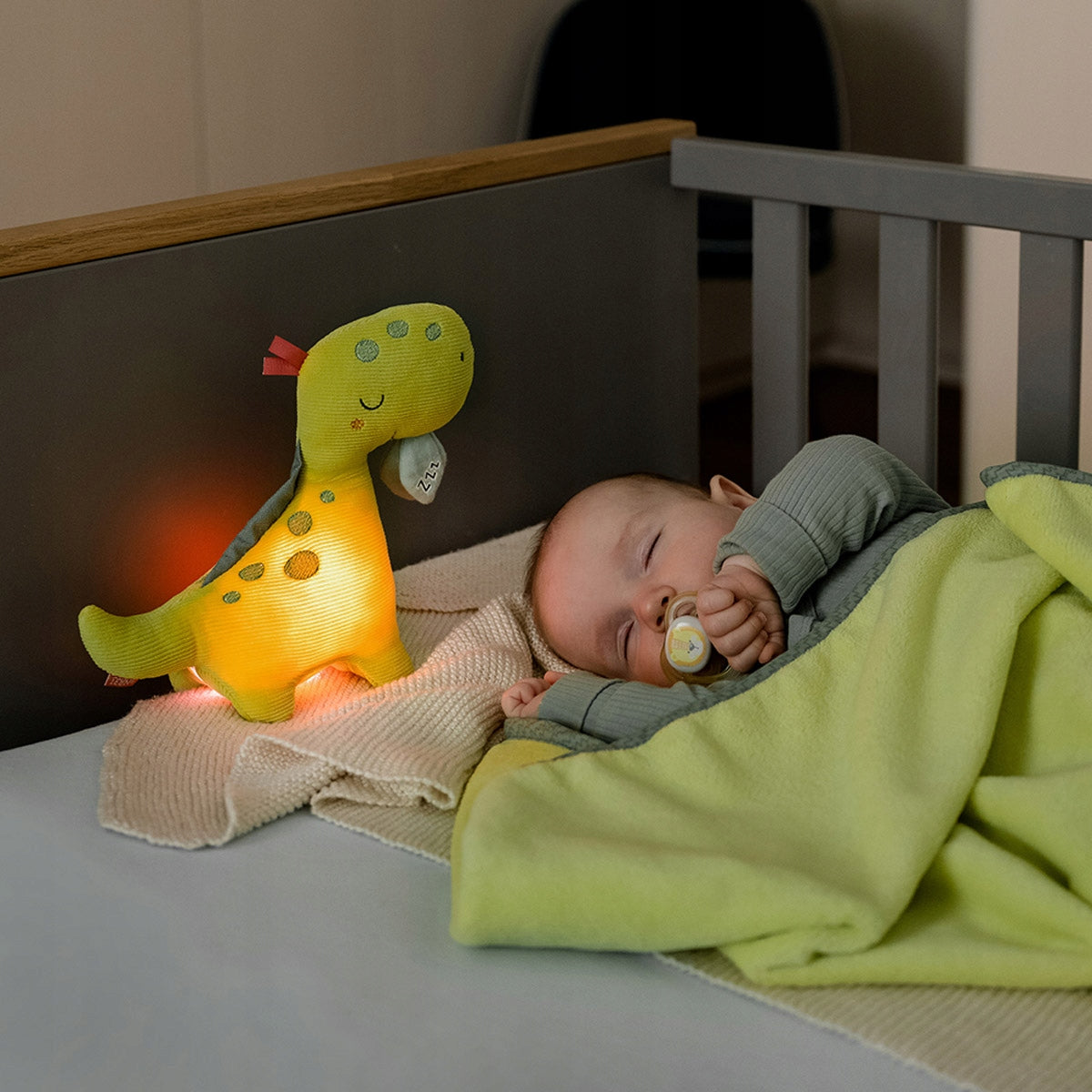FEHN peluche de bombazina com luz de presença DINO 20 x 23 cm