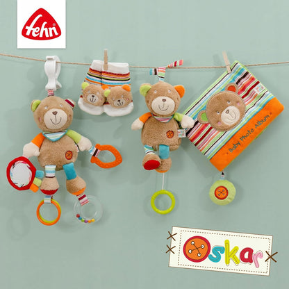 FEHN OSKAR stroller and car seat hanging toy with rattle and grabber