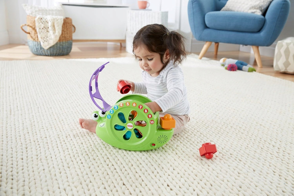 FISHER-PRICE FRB88 interaktív zenélő csiga német nyelvű