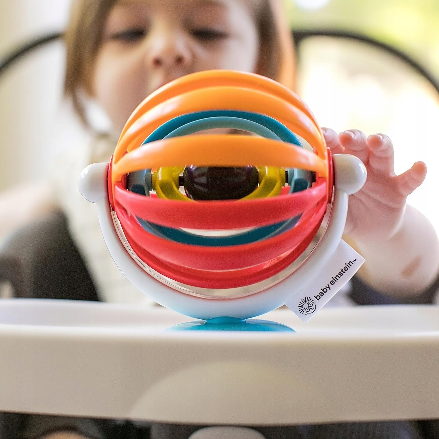BABY EINSTEIN Sticky Spinner játék csörgővel és tapadókoronggal, 3 hónapos kortól