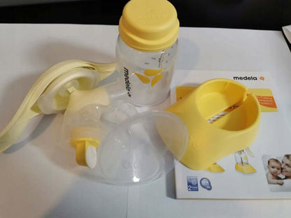 MEDELA Harmony 005.2052 laktator ręczny 2-fazowy U, żółty, używany, z akcesoriami