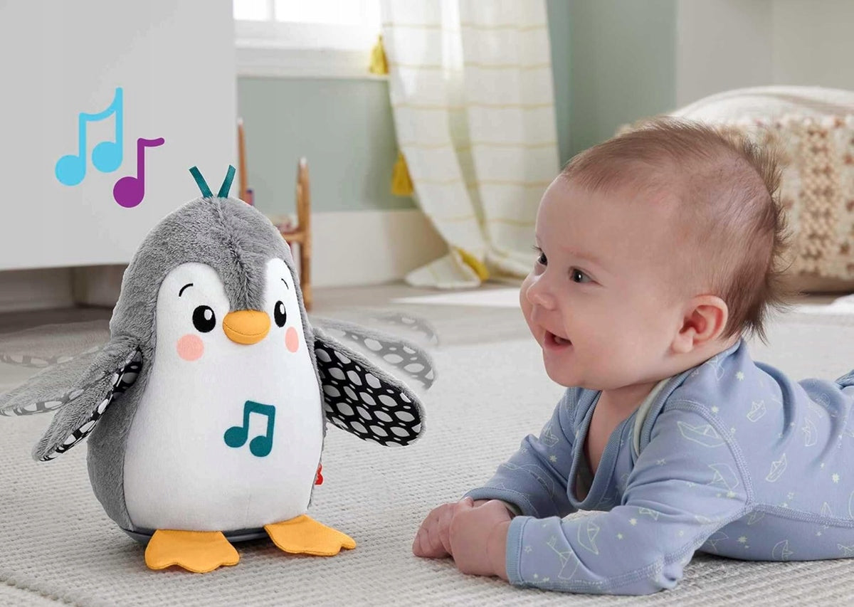 FISHER-PRICE HNC10 zenélő billegő pingvin, 21 cm
