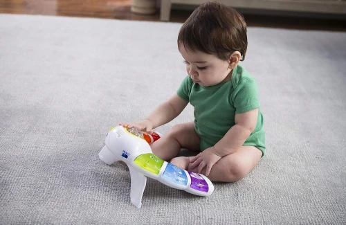 BABY EINSTEIN világító panel csörgővel, dallamokkal és szavakkal 3 nyelven